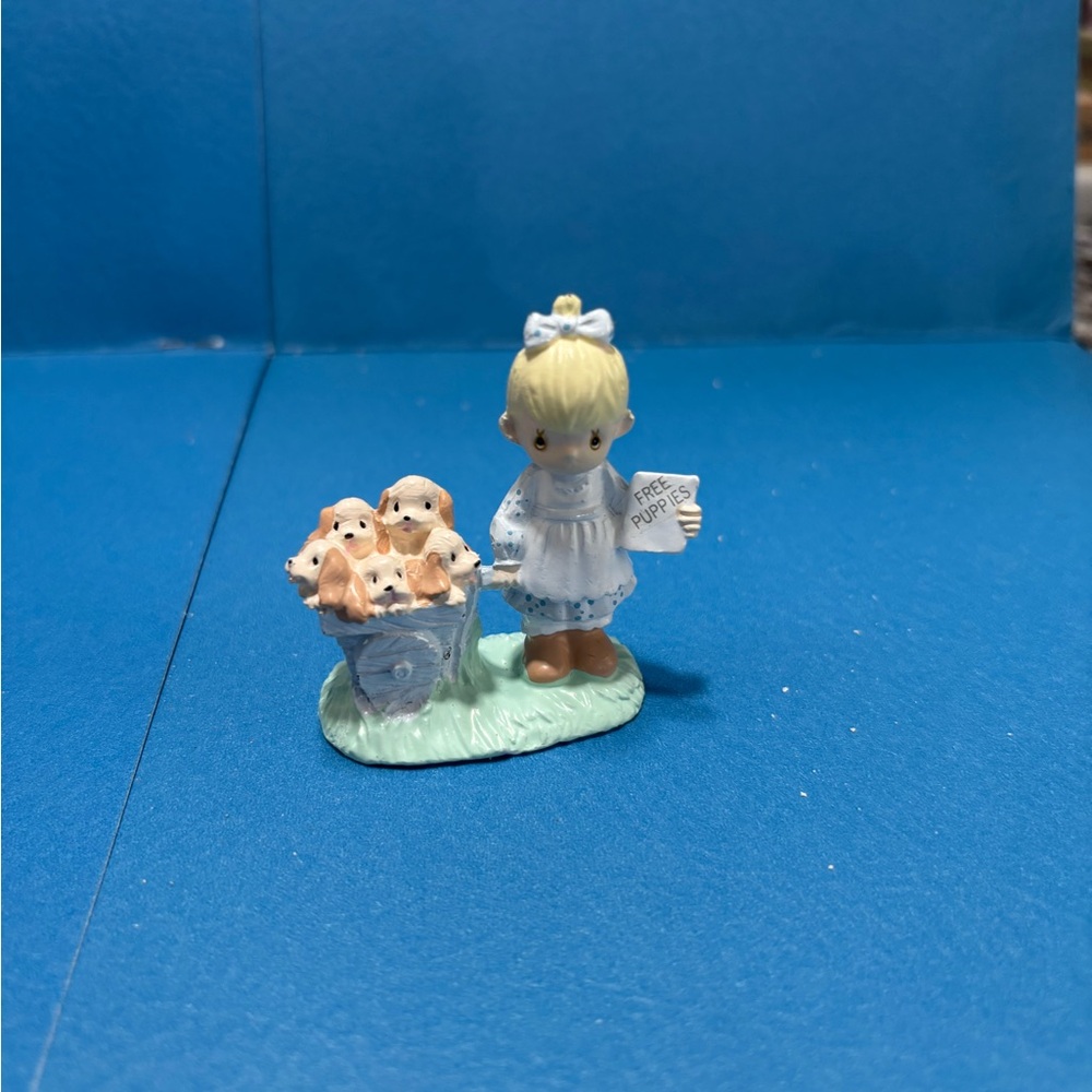 Adorable Figurine with Puppies